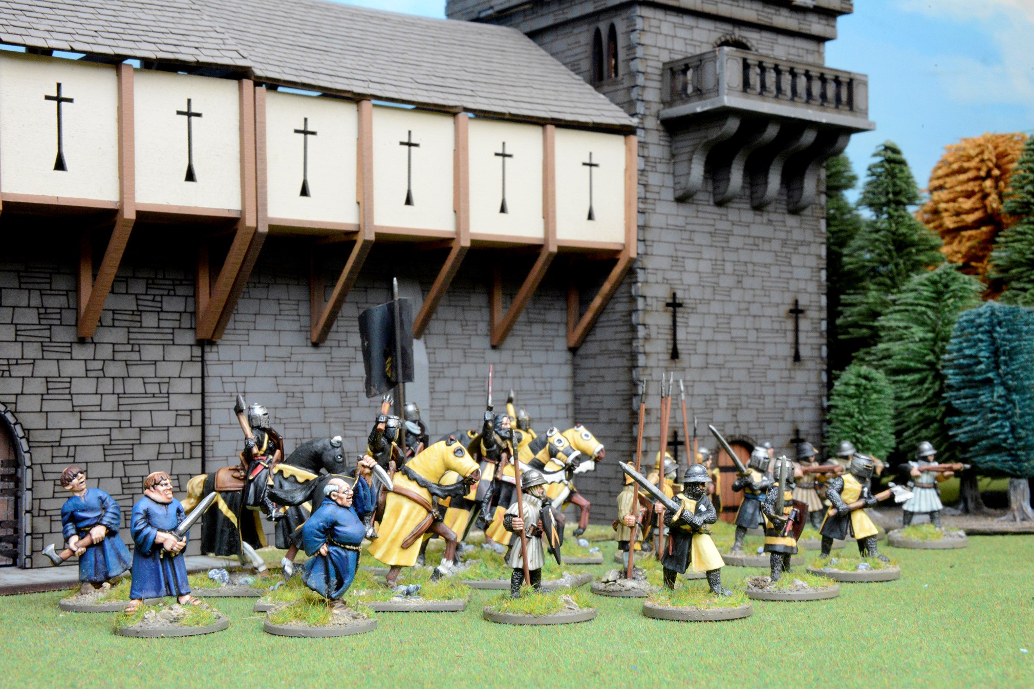 Lion Rampant: Second Edition image of miniatures marching out of a castle