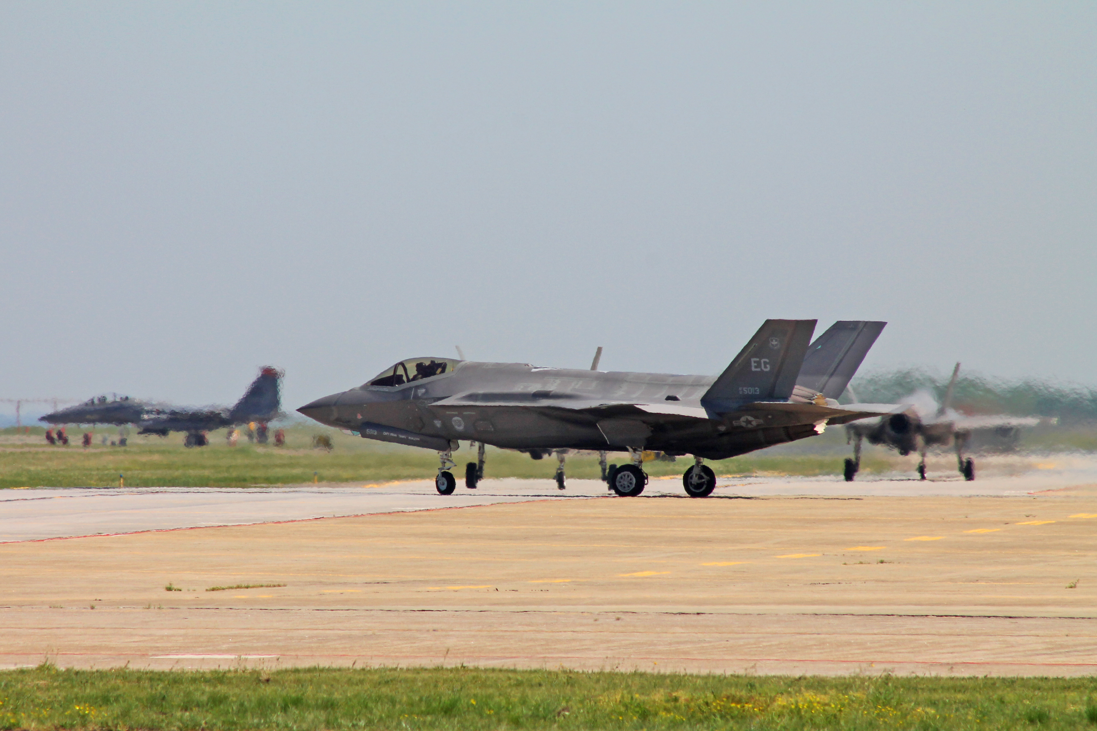 F-35 Lightning IIs of 33rd Fighter Wing taxing along the Langley flight line