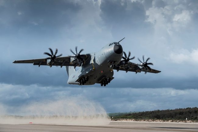 RAF A400M Atlas transport aircraft carrying out a series of spectacular test landings and take offs on a beach in South Wales.