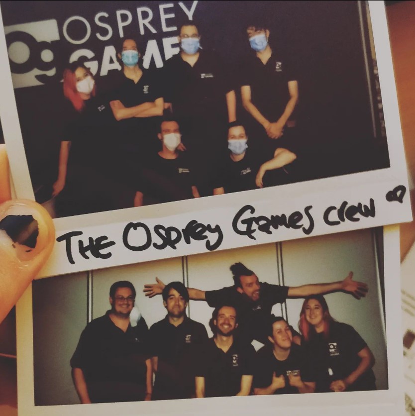 A photo of two polaroid pictures showing the Osprey Games team at the start and end of Essen Spiel 2022